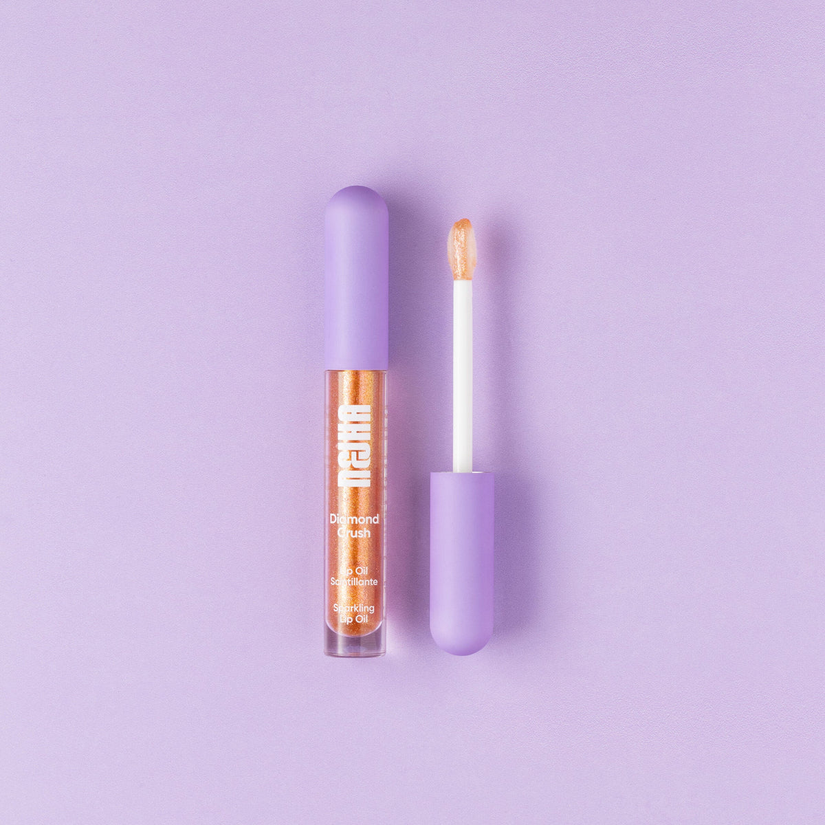 NEJHA Diamond Crush lip oil scintillante Amber Kiss – foto hero